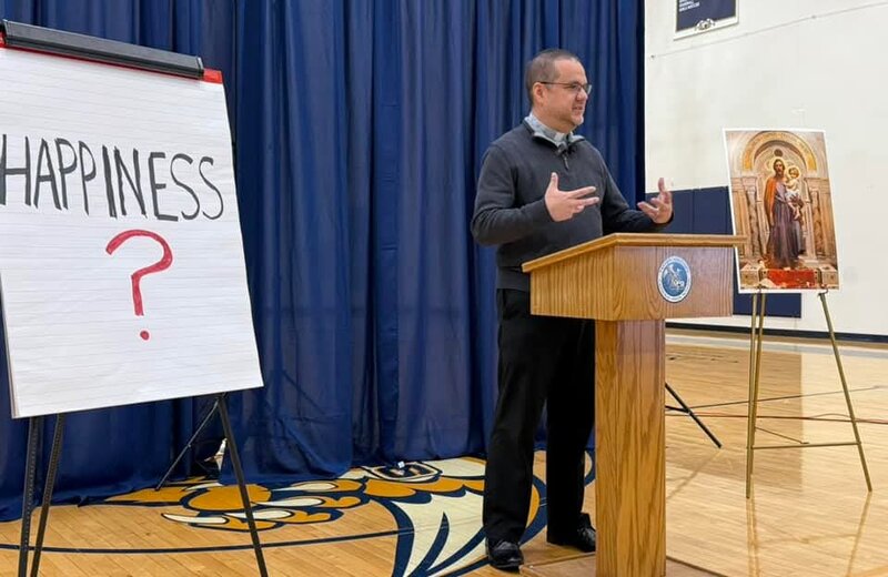 Michael Halbrook speaking at Fr. McGivney Men's Prayer Breakfast